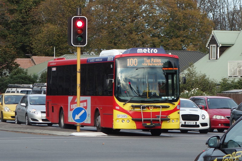 Public bus stopped at traffic lights