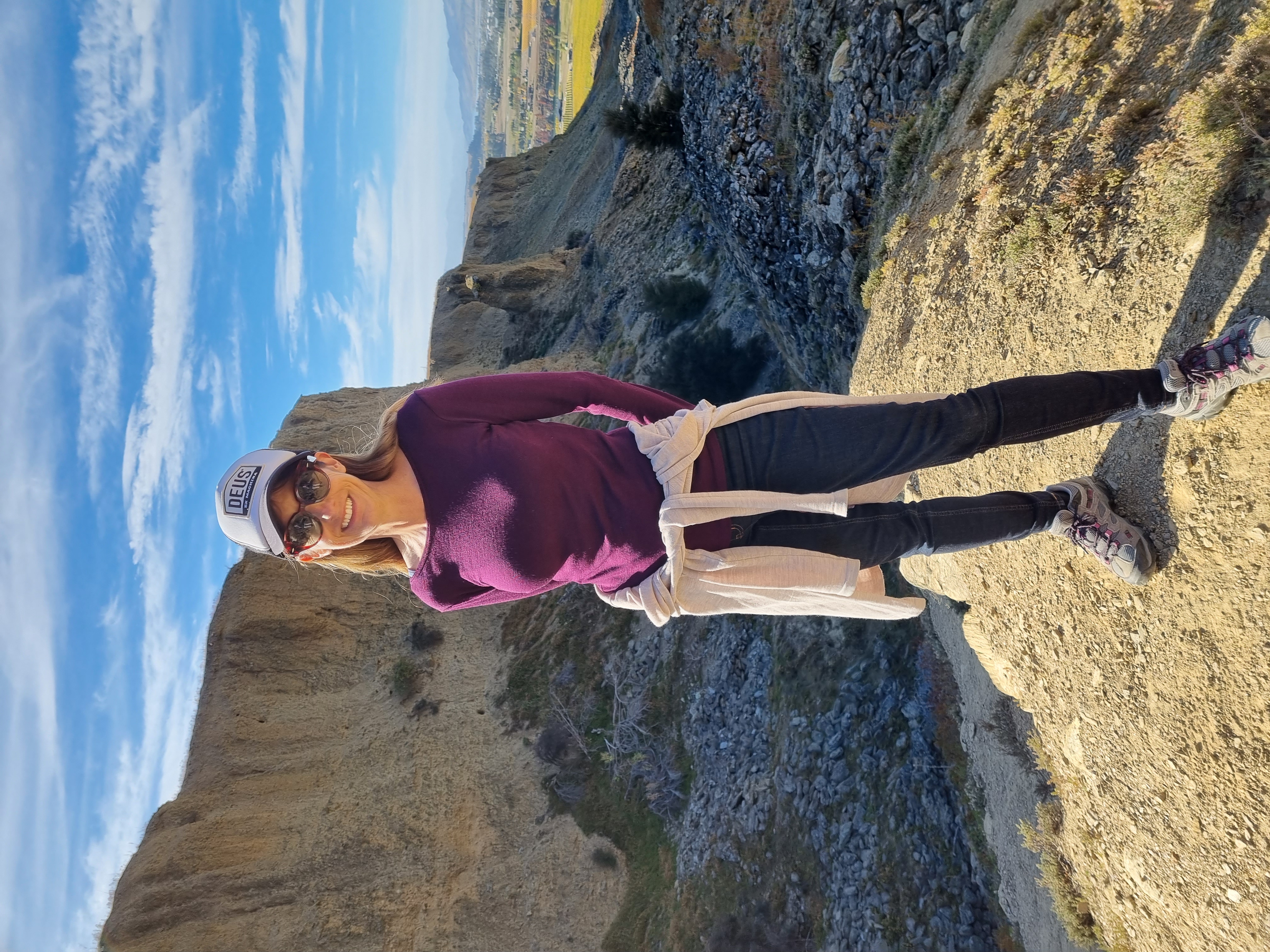 Debbie standing on the top of a hill overlooking Bannockburn Sluicings