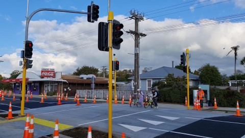 Children using new signalised crossing at SH3 in Inglewood