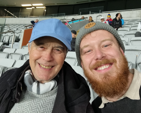 Pim with his dad at a Women's Football World Cup match in Auckland