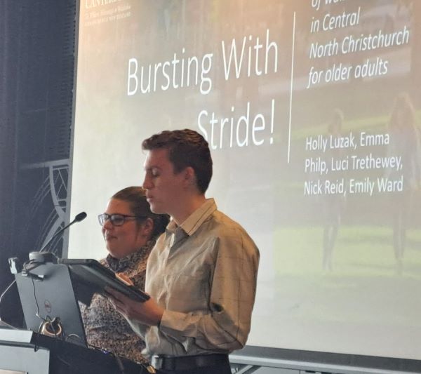 Emily Ward and Nick Reid presenting at the Walking Summit (July 2023)