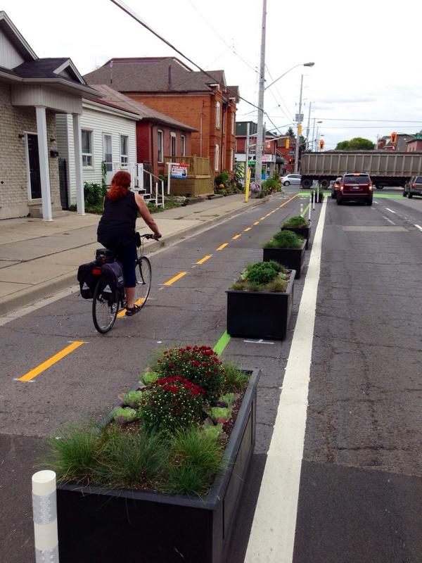 Planter boxes separating cycle lane