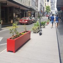side street in Auckland using temporary planters to create pedestrian space