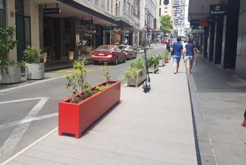 side street in Auckland using temporary planters to create pedestrian space