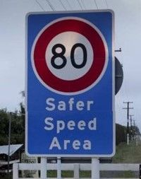 80 km Safer Speed Area road sign