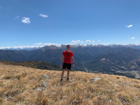 Niklas standing on a mountain