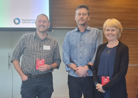 Glen and Julie receiving the award from Andrew Murray