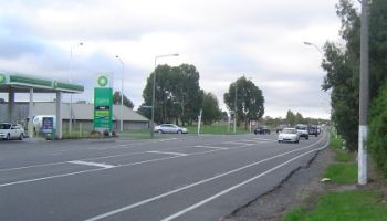 BP gas station next to a road and intersection