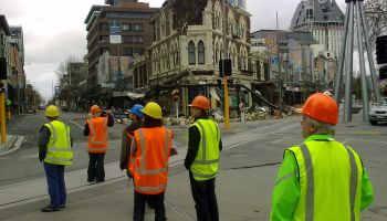 Engineers look at collapsed building 