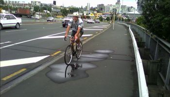 cyclist at auckland on footpath